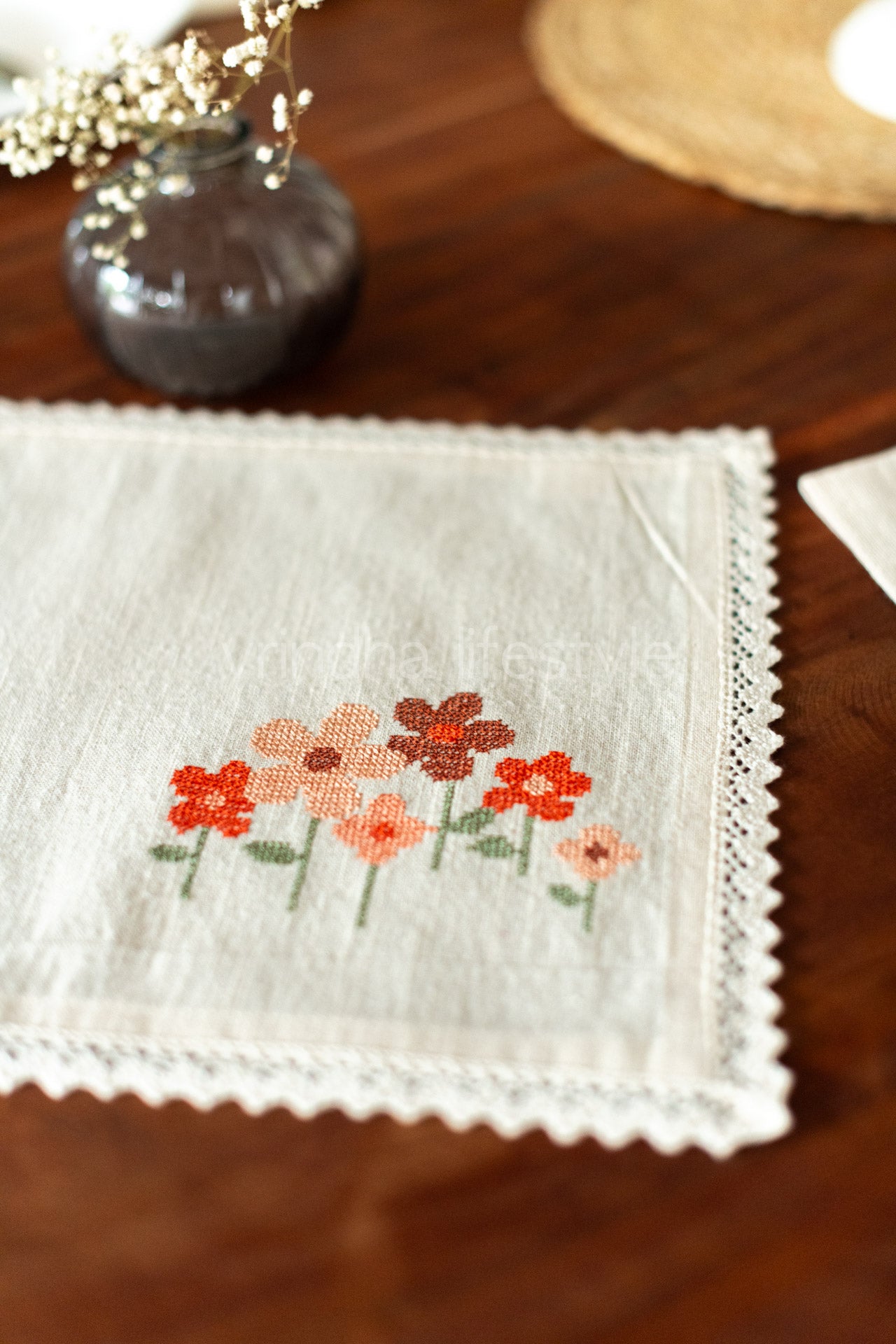 Cotton slub table mat with cross stitch embroidery and lace detailing