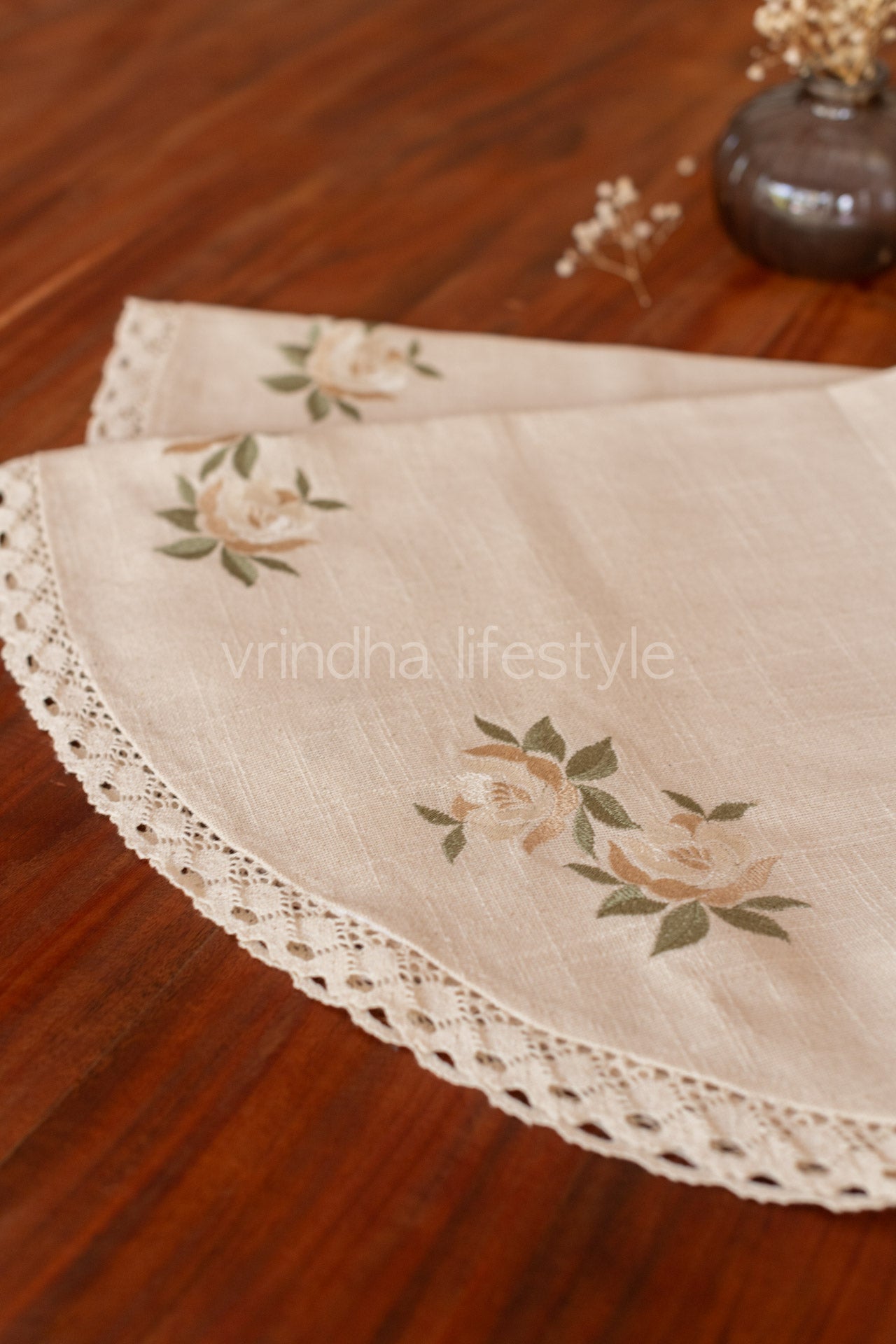 Coffee table cover with embroidery and lace detailing
