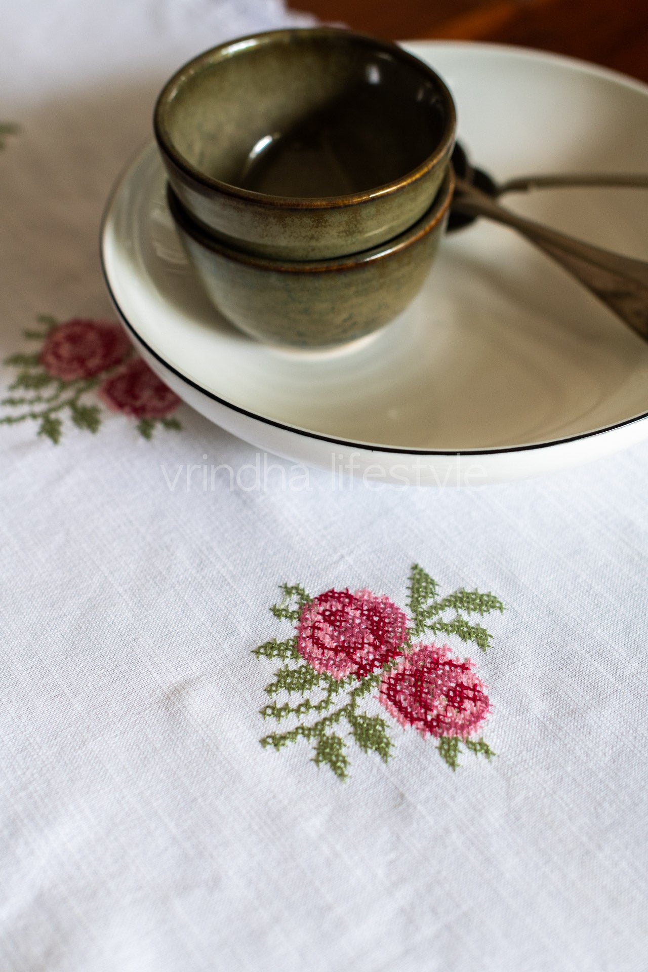 white floral cross stitch embroidery table runner with lace detailing