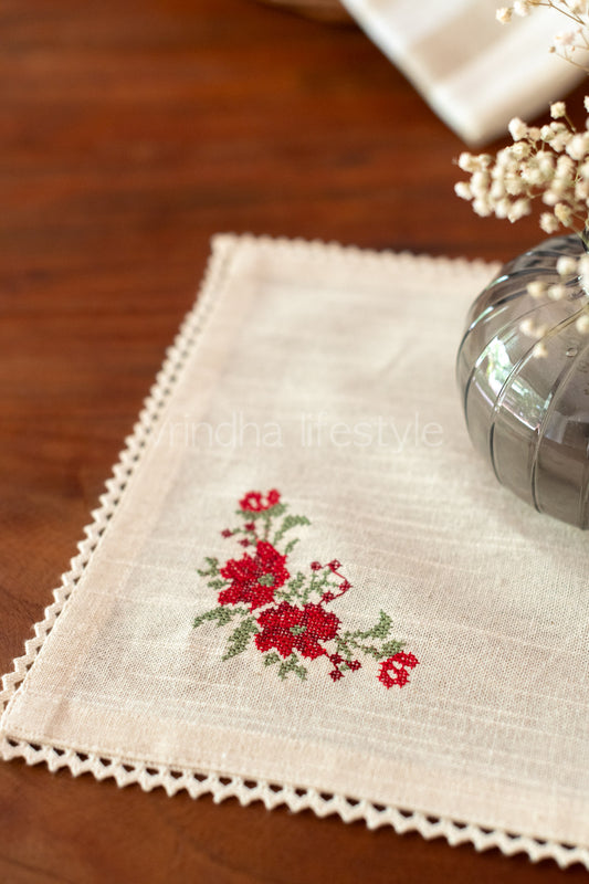 Cotton slub table mat with cross stitch embroidery and lace detailing