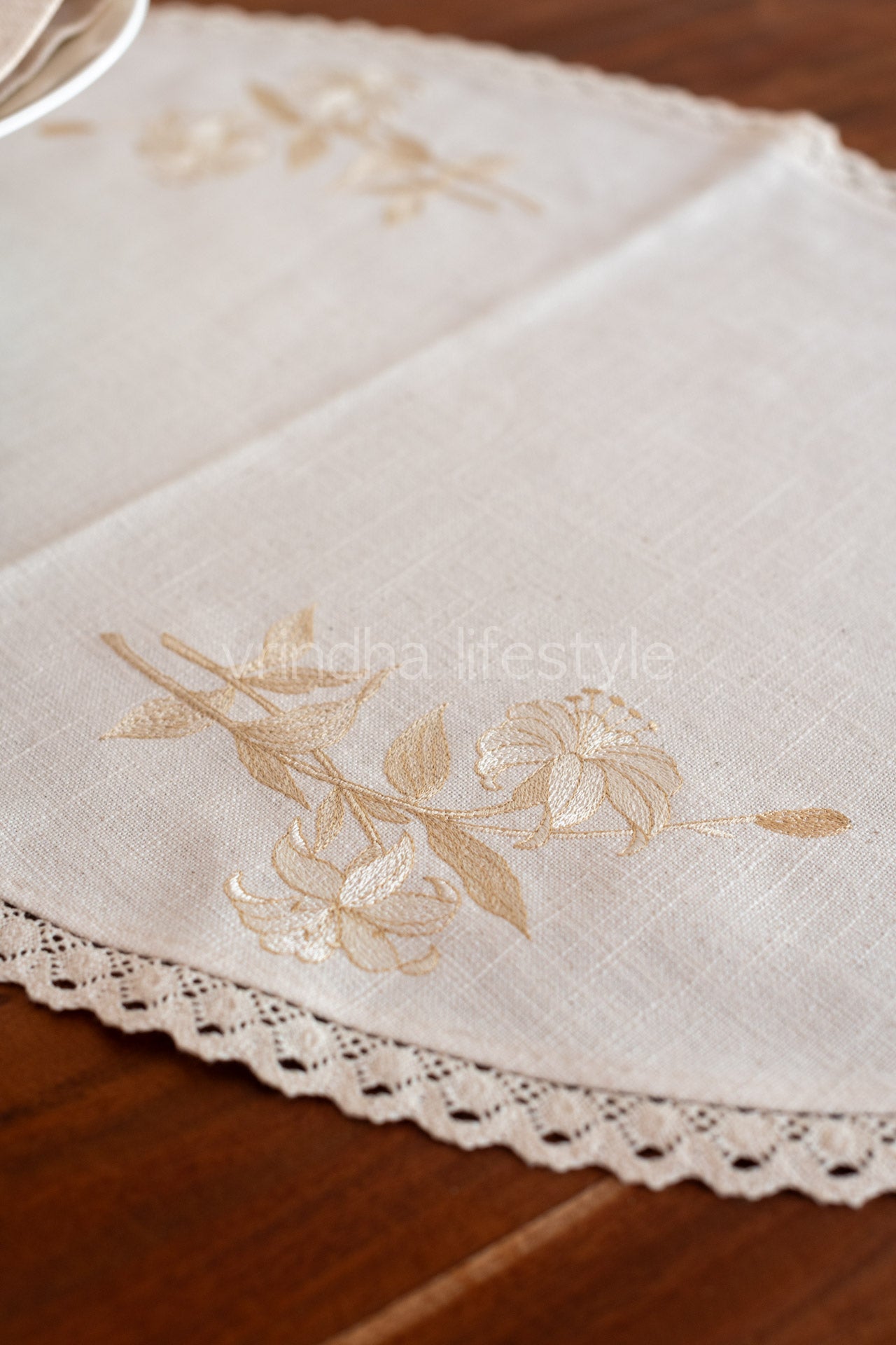 Oval  table mat with  embroidery and lace detailing-26x17 inches