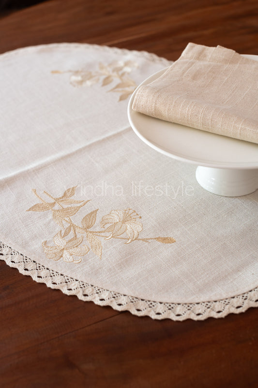 Oval  table mat with  embroidery and lace detailing-26x17 inches