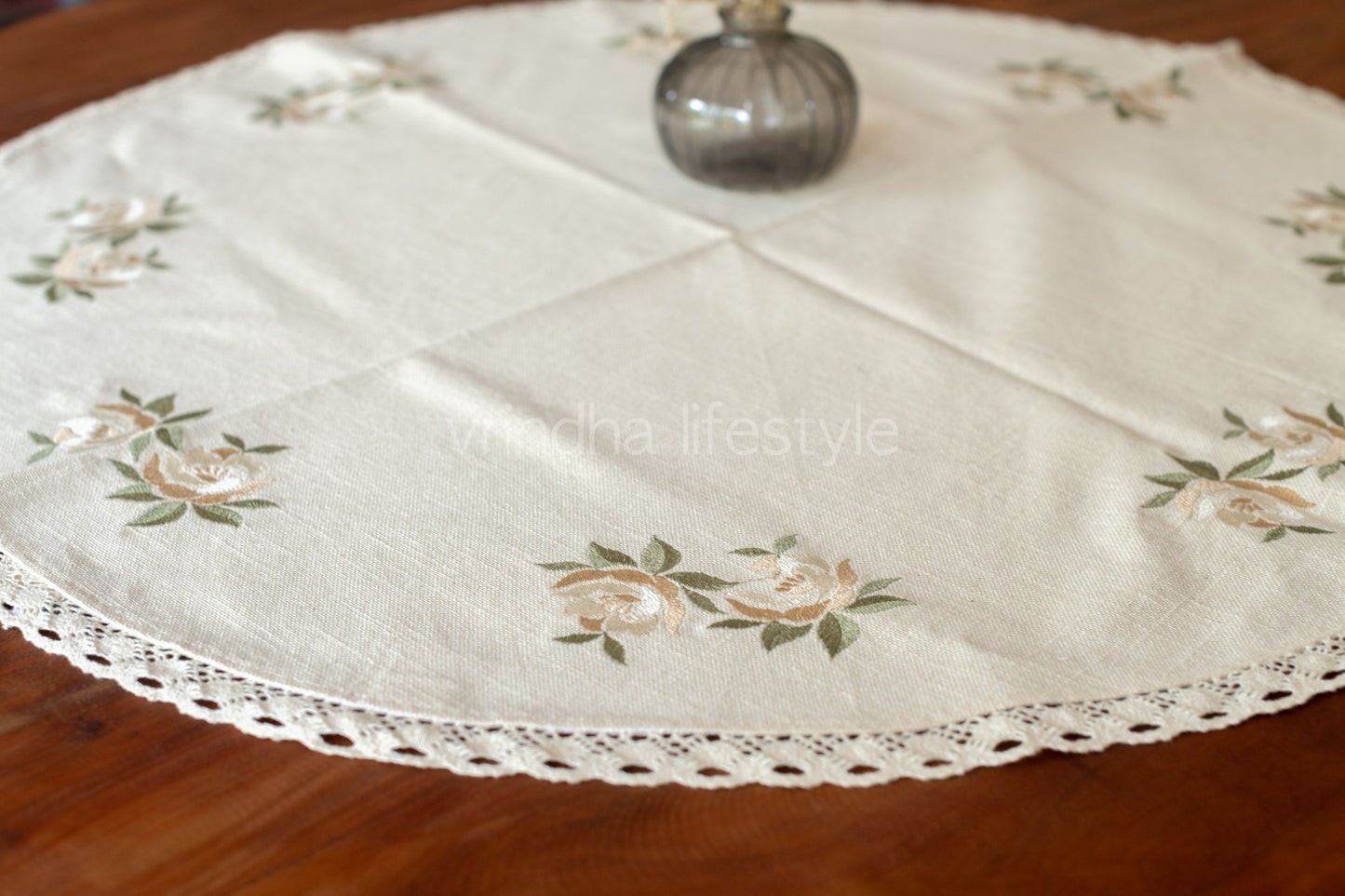 Coffee table cover with embroidery and lace detailing