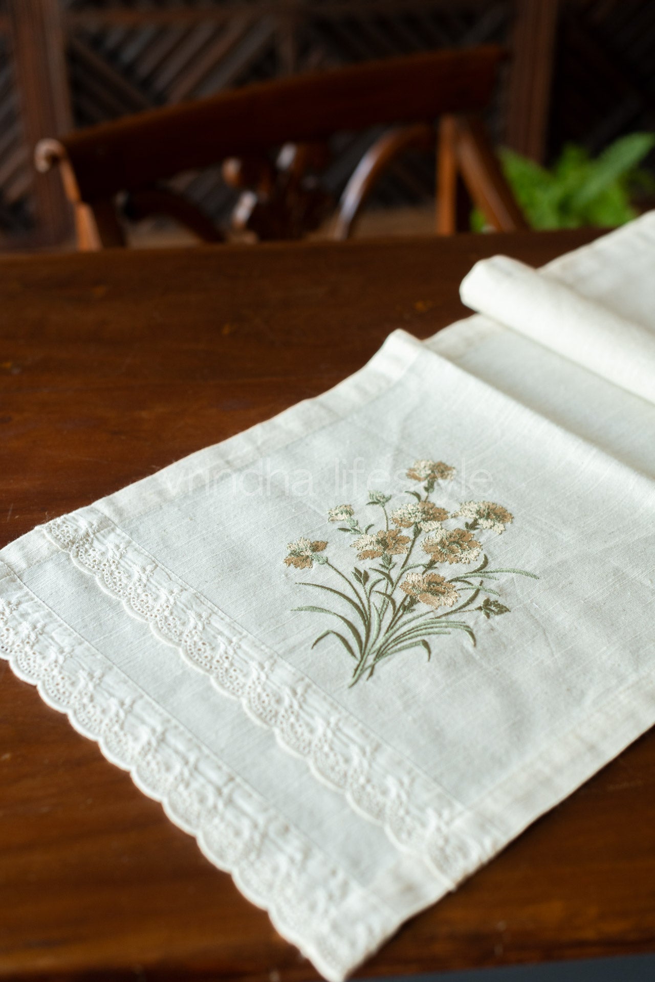 Cotton table runner with embroidery and lace detailing