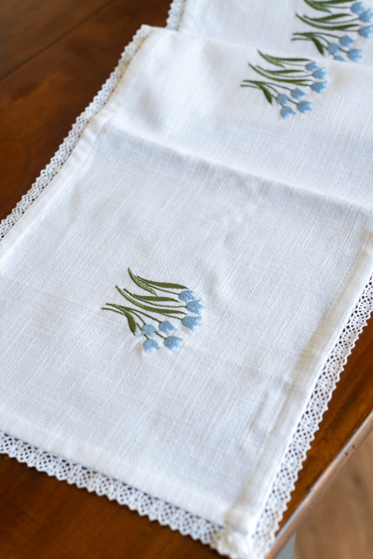 Table runner with embroidery and lace detailing -11x90 inches
