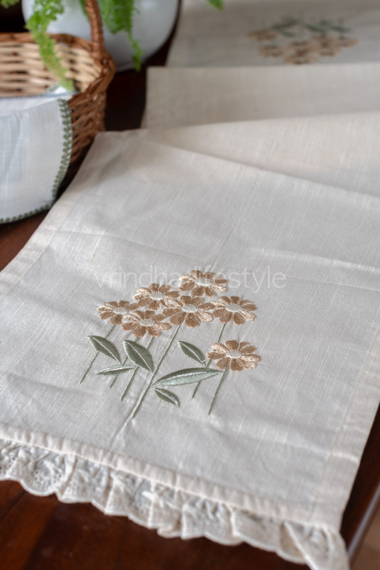 Cotton table runner with embroidery and lace detailing