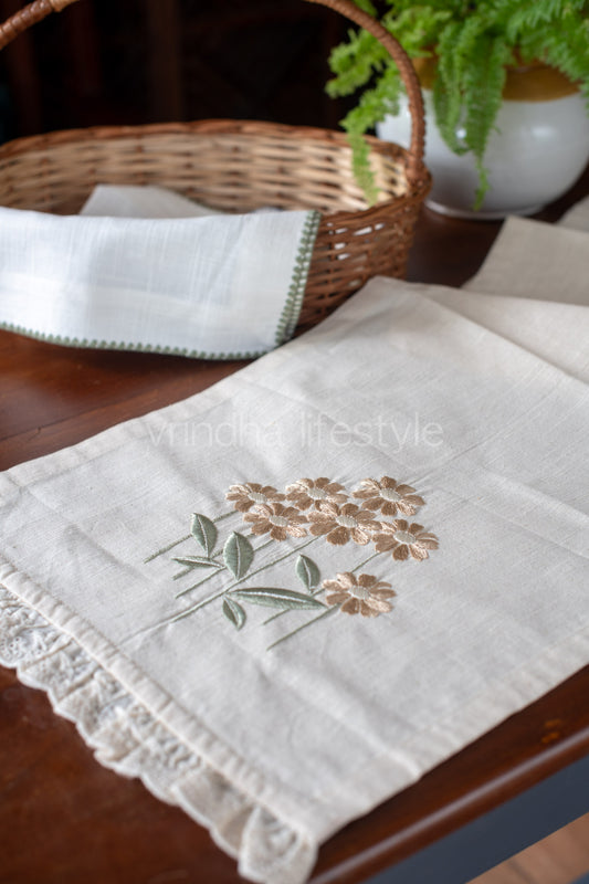 Cotton table runner with embroidery and lace detailing