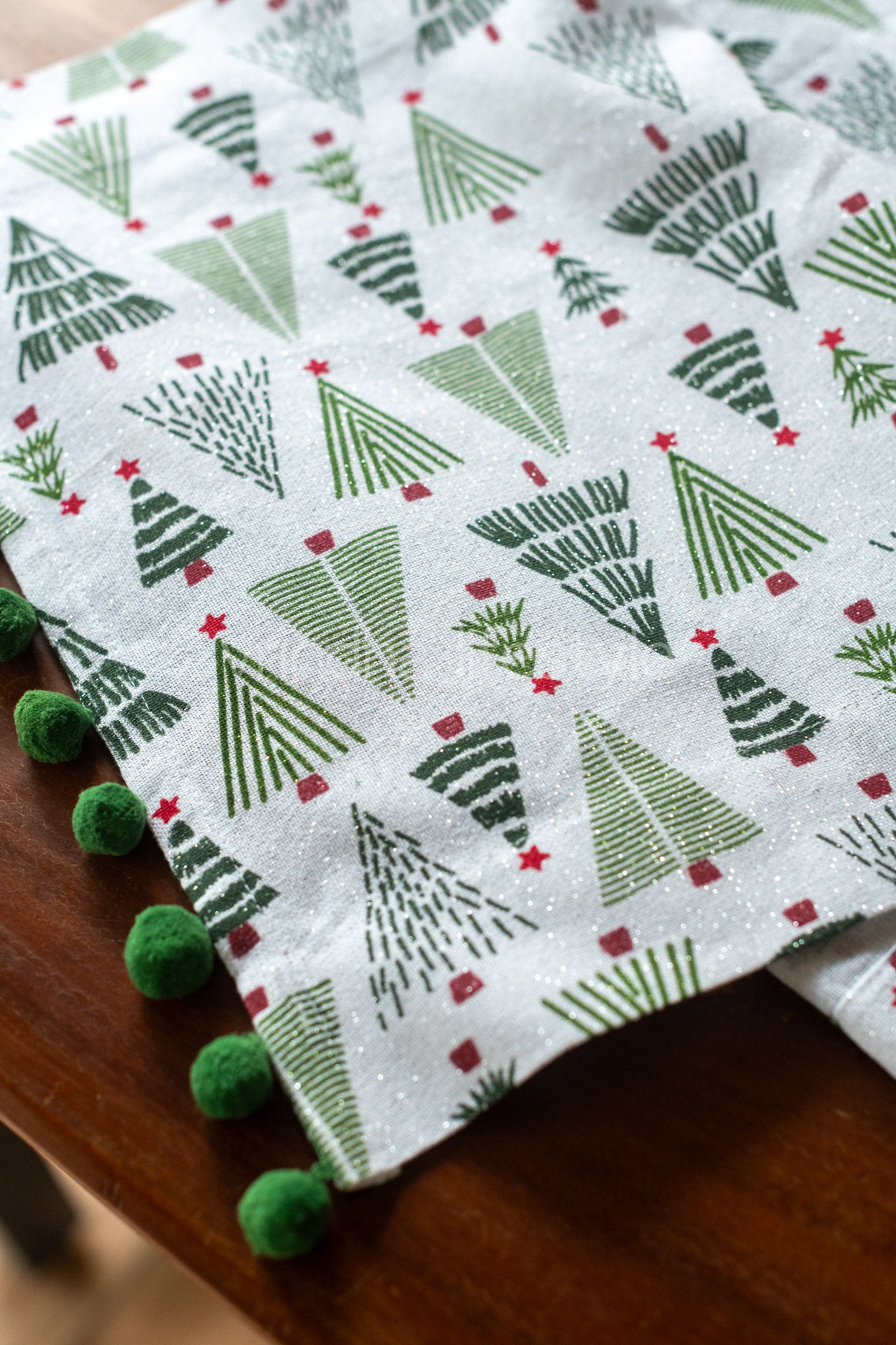 Printed cotton lurex table runner with  pom poms