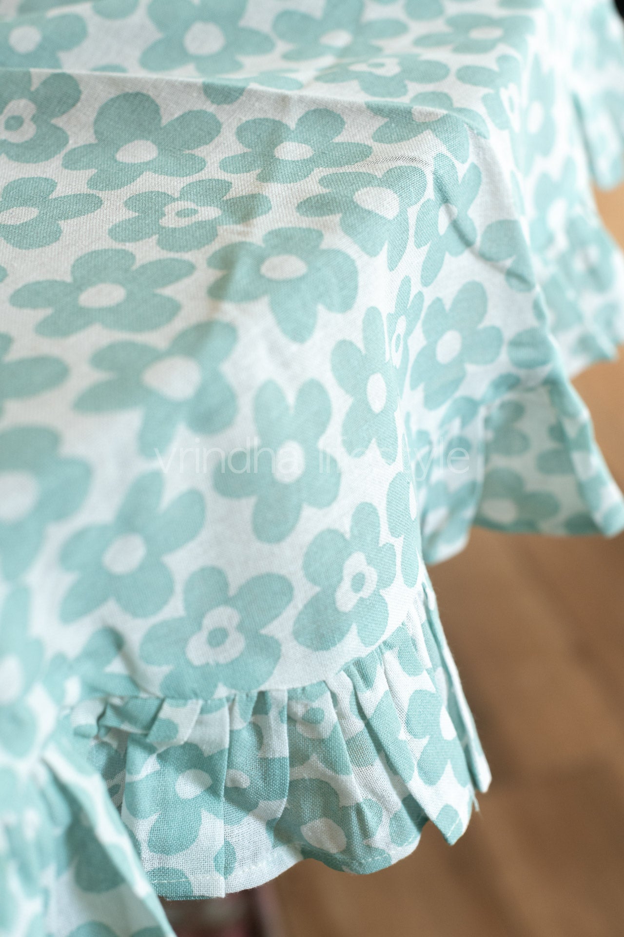 Printed cotton table cover with frill detailing-coffee table
